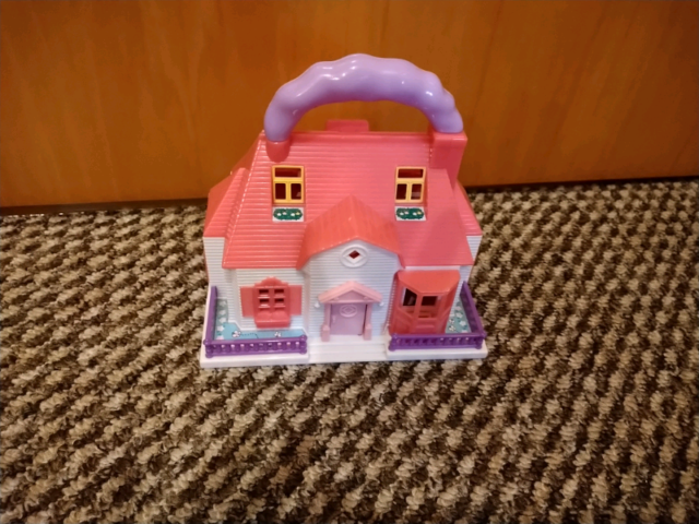 hello kitty carry along mini doll house